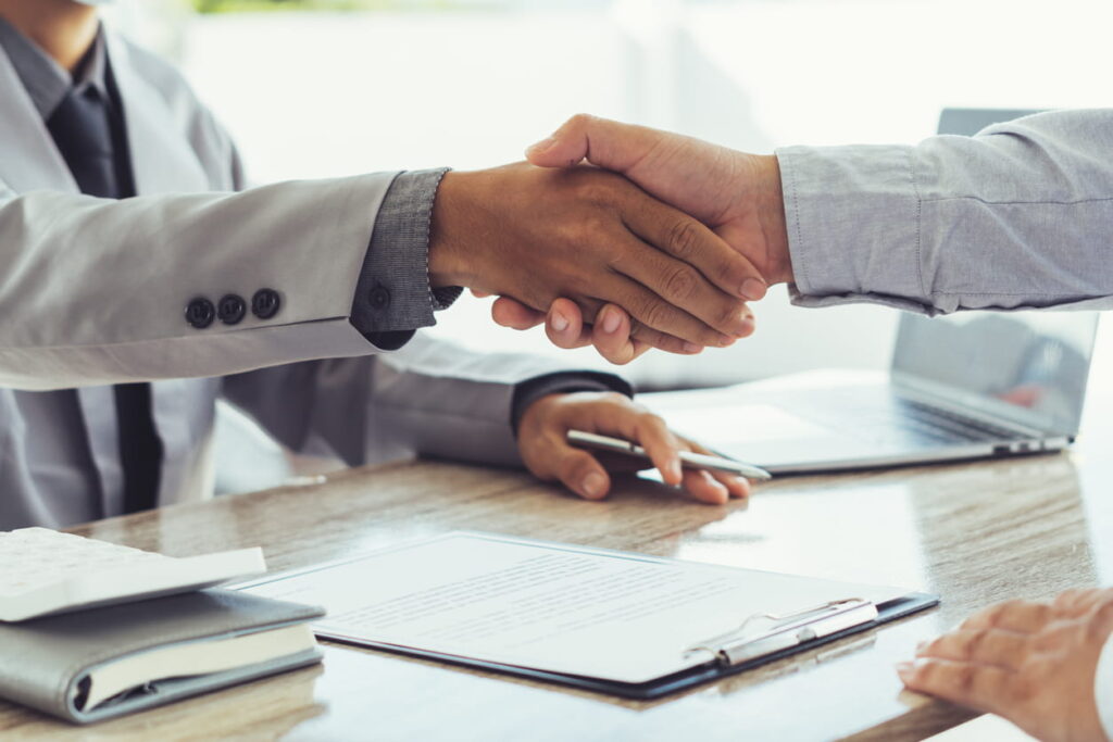 two people shaking hands